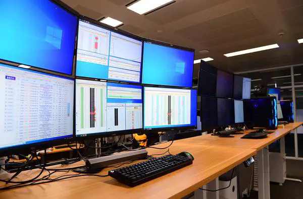 Low-Latency Trading and Automobile Racing